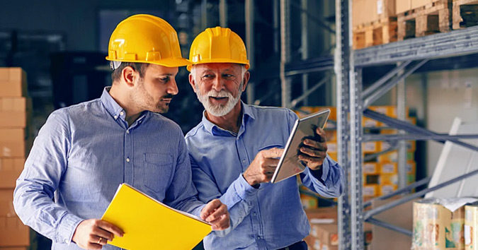 hp manufacturers men in hardhats in warehouse